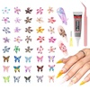 image:imageMelodySusie 100Pcs 3D Lily amp Butterfly MixedShape Nail Charms and Gems 20 Colors Flowers amp 15 Colors Butterfly Rhinestones with Tweezers for Nail Art Manicure Decorations and DIY Crafting